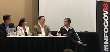 Kevin Park talks as Annalisa Nash Fernandez, Nick Inglis, and TeraThink's Laurence Hart listen during the closing panel of the InfoGovCon Leadership Summit. Picture by Jim Merrifield